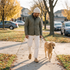 Tan · walking the dog on an autumn sidewalk
