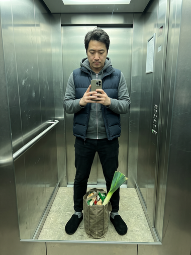Black Suede Relief Clog in an elevator mirror photo