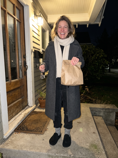 Black Suede Relief Clog on a doorstep at night